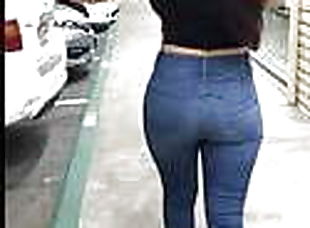 Candid large bum legal age girlr in black jeans